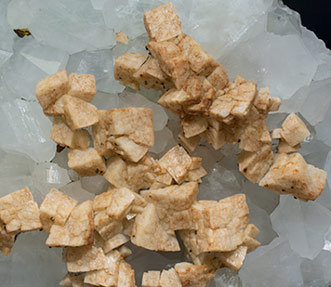Dolomite on Quartz and Chalcopyrite. 
