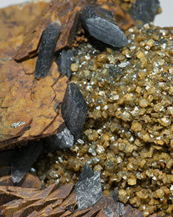 Dolomite with Siderite and Gypsum with inclusions of Boulangerite. 