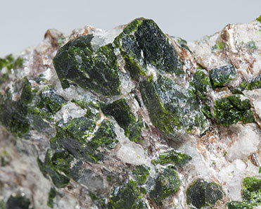 Mn-rich Andalusite (variety viridine) with Quartz and Mica. 