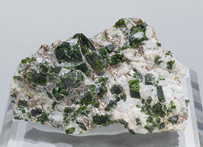 Mn-rich Andalusite (variety viridine) with Quartz and Mica.