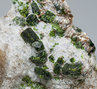 Mn-rich Andalusite (variety viridine) with Quartz and Mica. 