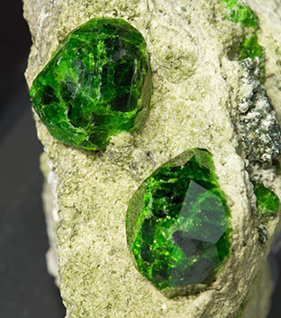 Andradite (variety demantoid). 