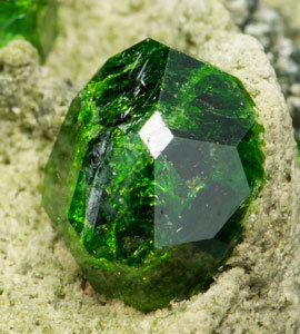 Andradite (variety demantoid). 