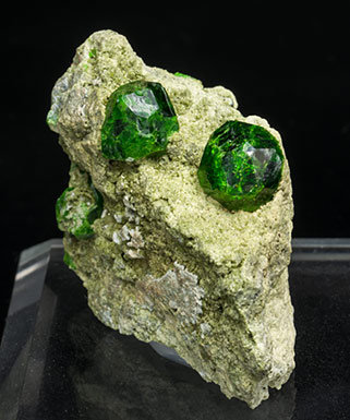 Andradite (variety demantoid).