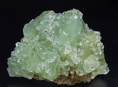 Datolite with Fluorapophyllite-(K) and Garnet.