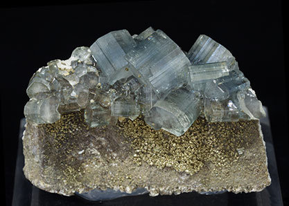Fluorapatite with Pyrite and carbonates. 