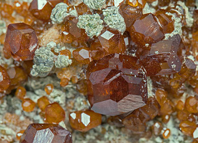 Grossular (variety hessonite) with Chlorite. 