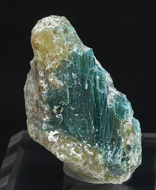 Grandidierite with Quartz, Feldspar and Diopside.