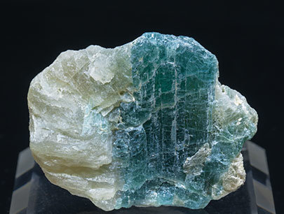 Grandidierite with Quartz, Feldspar and Diopside.