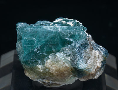 Grandidierite with Quartz, Feldspar and Diopside. 