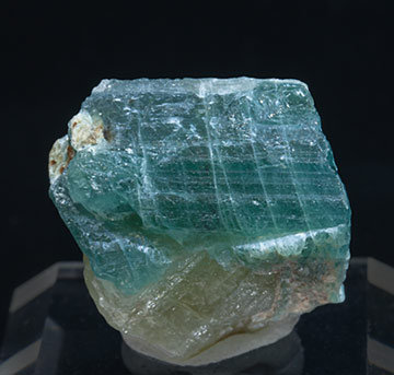 Grandidierite with Quartz, Feldspar, Diopside and Mica.