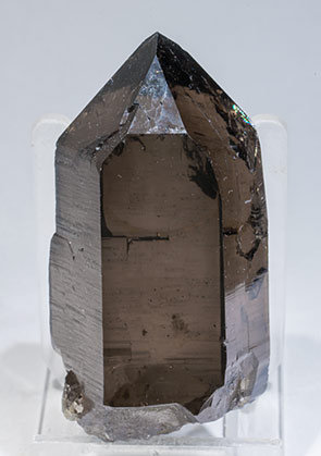 Quartz (variety smoky) with Hematite inclusions.