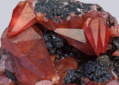 Rhodochrosite with manganese oxides. 