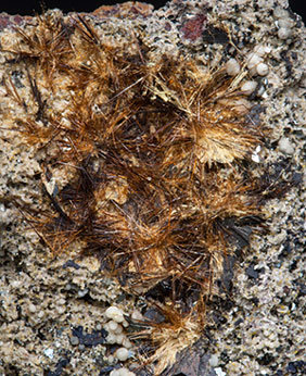 Yuanfuliite with Hematite and Calcite. 