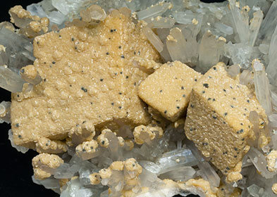 Calcite with ferroan Dolomite, Quartz and Pyrite. 