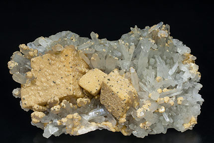 Calcite with ferroan Dolomite, Quartz and Pyrite.