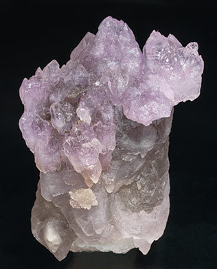 Quartz (variety rose quartz) on Quartz (variety smoky).