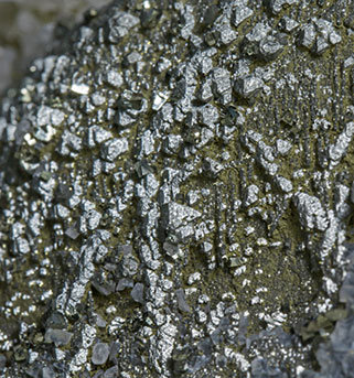 Stannite with Chalcopyrite, Pyrite, Marcasite, Siderite and Calcite. 