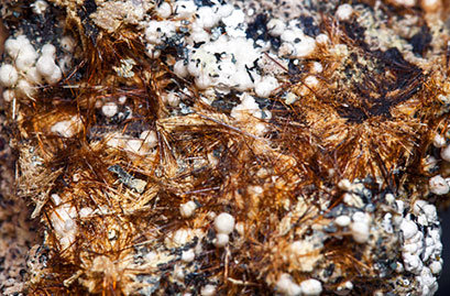 Yuanfuliite with Hematite and Calcite. 