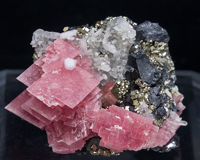 Rhodochrosite with Quartz, Sphalerite and Pyrite.