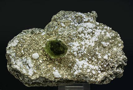 Fluorapatite with Pyrite, Calcite-Dolomite and Muscovite.