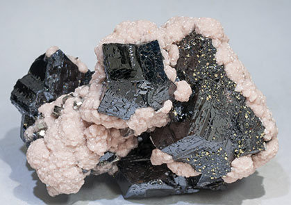 Sphalerite with Rhodochrosite, Pyrite, Galena and Arsenopyrite.