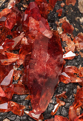 Rhodochrosite with manganese oxides. 