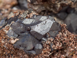 Cuprite with Wulfenite and Dolomite. 