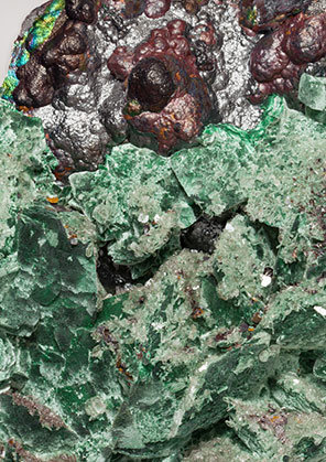 Malachite after Azurite with Baryte and Goethite. 