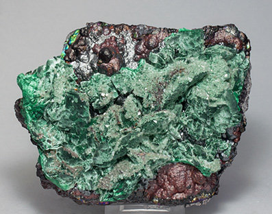 Malachite after Azurite with Baryte and Goethite. 