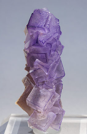 Fluorite with Baryte on Stibnite.