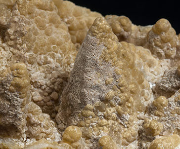 Smithsonite after Calcite with Hemimorphite. 