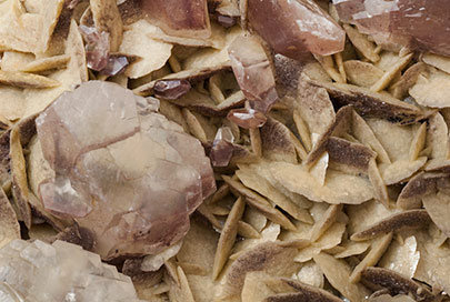 Calcite with Siderite, Dolomite and Hematite. 