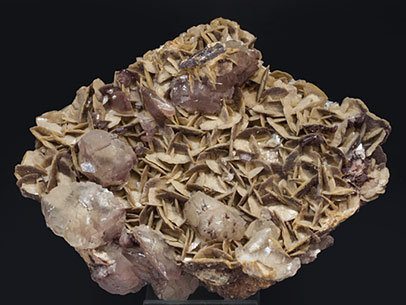 Calcite with Siderite, Dolomite and Hematite.