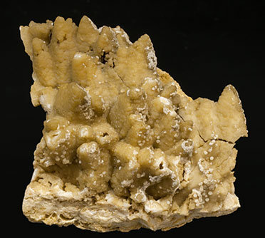 Smithsonite after Calcite with Hemimorphite. 