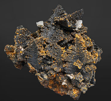 Willemite after Descloizite with Mimetite and Calcite.