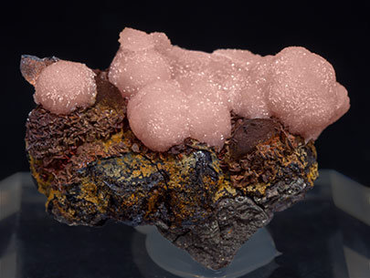 Rhodochrosite with Pyrrhotite and Galena.