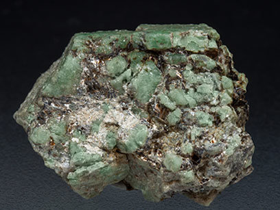 Beryl (variety emerald) with Phlogopite. Rear