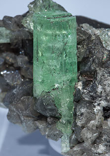 Beryl (variety emerald) with Calcite. 