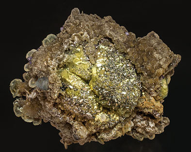 Chalcopyrite with Arsenopyrite, Fluorapatite, Siderite and Muscovite.