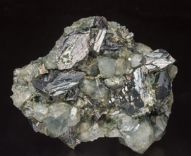 Topaz with Arsenopyrite, Muscovite and Chlorite.