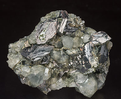 Topaz with Arsenopyrite, Muscovite and Chlorite. 