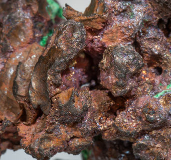 Copper with Cuprite, Calcite and Malachite. 