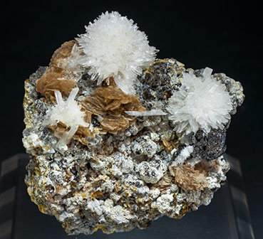 Roweite with Olshanskyite and Andradite.