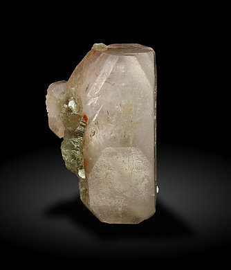 Beryl (variety morganite) with Muscovite. Side