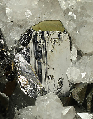 Tetrahedrite (silver rich variety) with Chalcopyrite and Quartz. 
