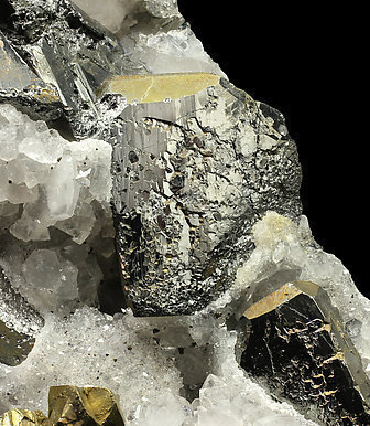 Tetrahedrite (silver rich variety) with Chalcopyrite and Quartz. 