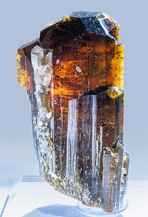 Elbaite with Mica and Quartz. Light behind