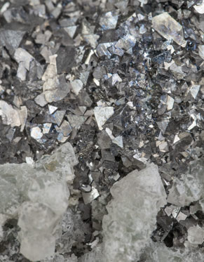 Löllingite with Arsenopyrite, Quartz, Magnetite and Calcite. 