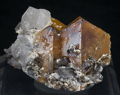 Scheelite with Quartz, Ferberite, Cassiterite, Pyrite and Mica.